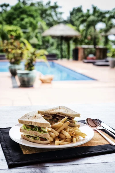 Club sandwich snack with french fries on plate — Stock Photo, Image