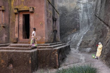 pilgrims at lalibela ancient rock-hewn monolithic churches landmark UNESCO heritage site in north ethiopia clipart