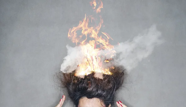 Brunette woman head hair on fire in flames — Stock Photo, Image