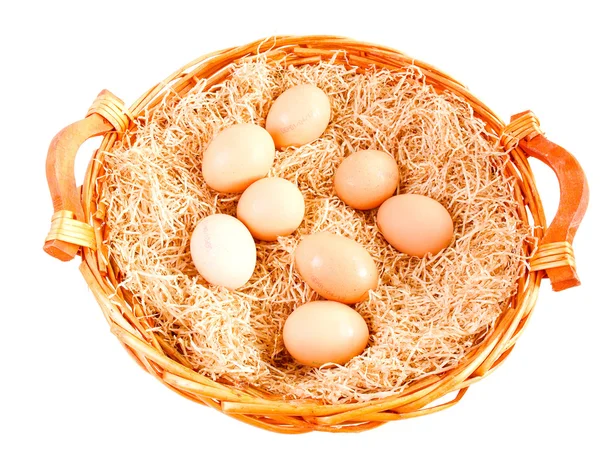 Retro look Eggs in wicker basket — Stock Photo, Image