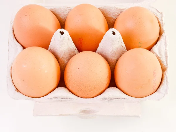 Ovos olhar retro na caixa de papelão — Fotografia de Stock