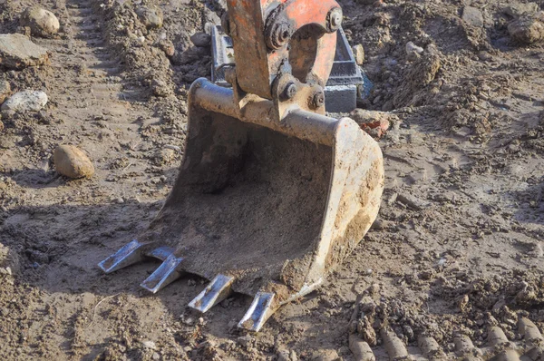 Excavator digging a hole — Stock Photo, Image