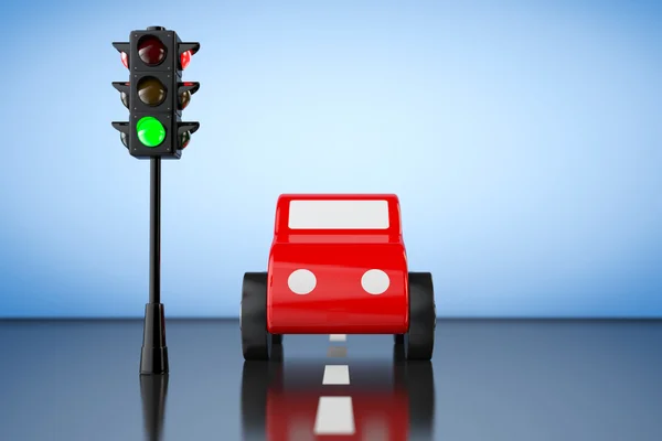 Carro de brinquedo vermelho dos desenhos animados com semáforo. Renderização 3d — Fotografia de Stock