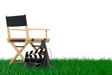 Yönetmen koltuğu, film Clapper ve megafon çim üzerinde. 3D Rende