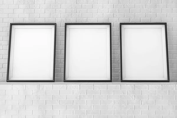 Marcos de imagen en blanco en la pared de ladrillo. Renderizado 3d —  Fotos de Stock
