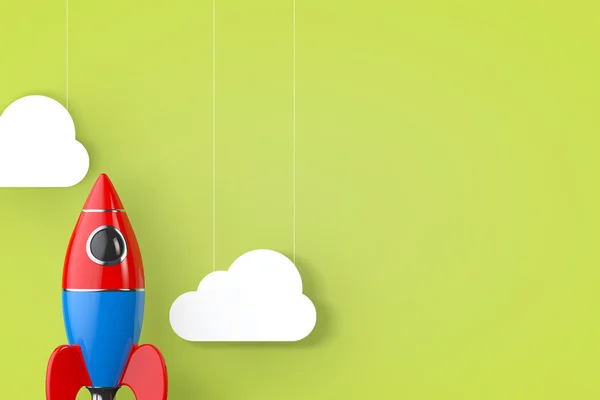 Spielzeugrakete mit Wolken. 3D-Darstellung — Stockfoto