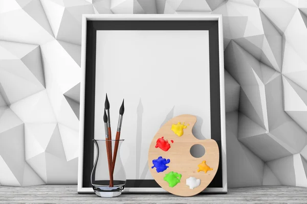 Blank Picture Frame with Paintbrushes and Pallette in front of L — Stock Photo, Image