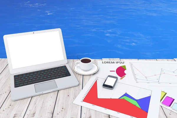 Modern Laptop with Cup of Coffee and Business Graph in front of — Stock Photo, Image