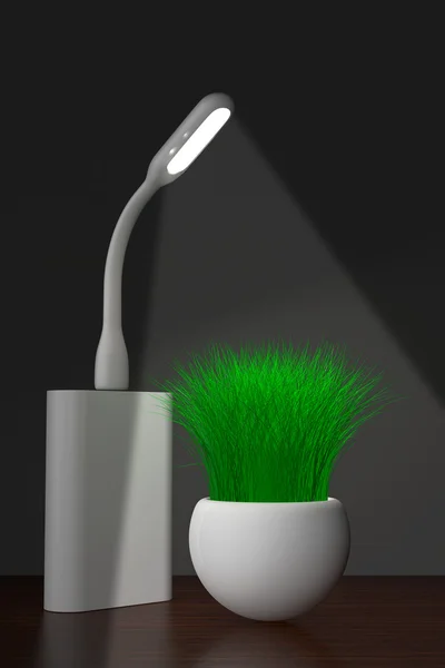 LED-USB-Lampe mit Powerbank und Gras im Pflanzkübel. 3D-Darstellung — Stockfoto