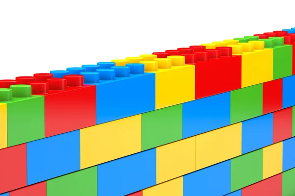 Wall from children plastic blocks — Stock Photo, Image