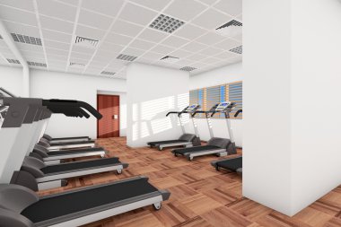 Üst üste spor salonunda koşu bandı