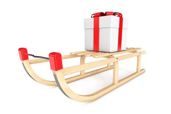 Trineos de madera con caja de regalo — Foto de Stock