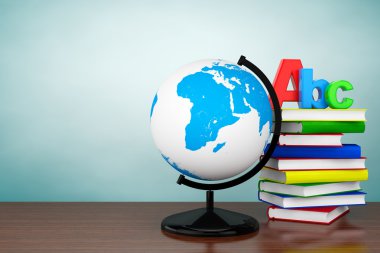 Old Style Photo. Books with ABC sign and World desktop globe