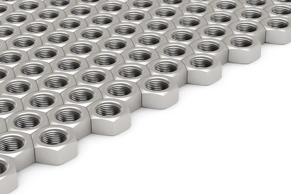 Array of Silver Machine Nuts in a symmetrical pattern — Stock Photo, Image