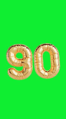 Sosyal Medya için 4k Çözünürlük Dikey Videosu: Yıldönümü Kutlaması Kavramı. Parlak Altın Balon Alfa Matte ile Yeşil Ekran Arkaplanında 90 Numaralı Hareket Şeklinde