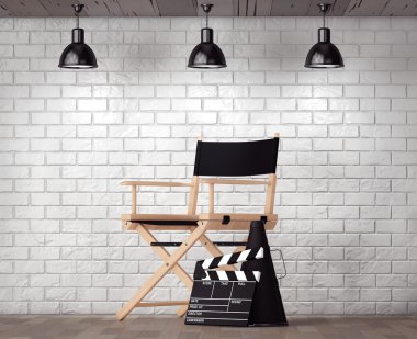 Yönetmen koltuğu, film Clapper ve megafon önünde tuğla Wa