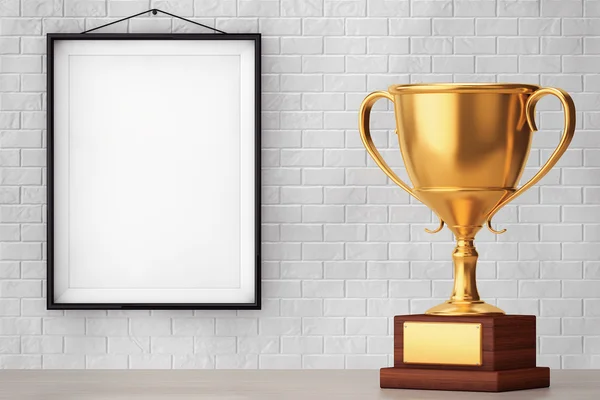 Goldene Trophäe vor Ziegelwand mit leerem Rahmen — Stockfoto