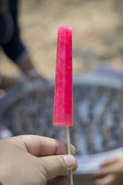 Traditional thai ice cream in stanless tube on market