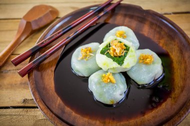 Şeker Kuicheai, soya kaynaklı sarımsak soğanı. Dim sum Çin mutfağıdır..