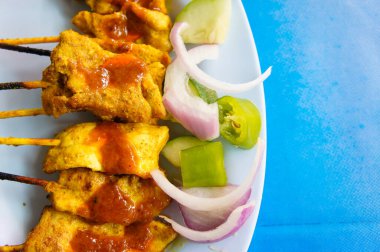 Fıstık soslu ızgara domuz eti ve sirke.