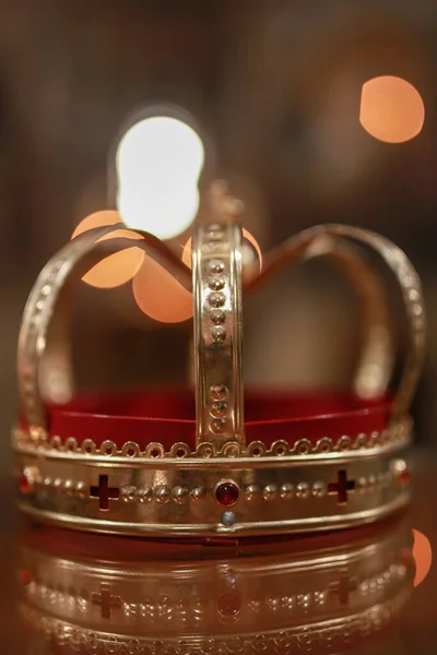 Church attributes for wedding ceremony. Gold crown on the altar. Wedding concept