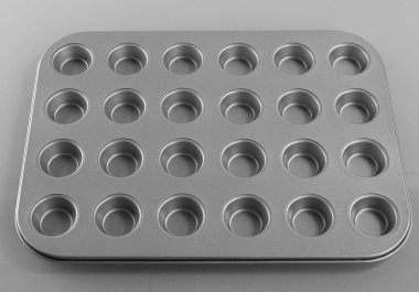 Pişirme, pişirme ve ev konsepti. Boş muffin kalıplarını kapat