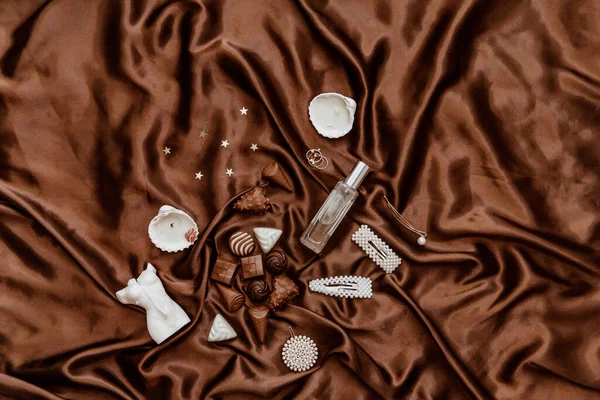 Styled Flat Lay Jewellery Chocolate Candy Woman Body Shapecandle Brown — Fotografia de Stock