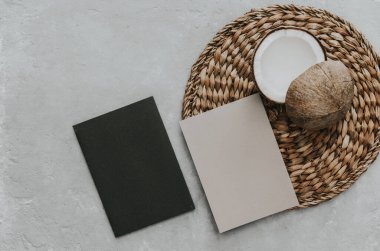 Creative summer minimal mock-up. Dried palm leaves and coconut  on neutral background. Still life minimal concept. Flat lay, top view, copy space, square clipart