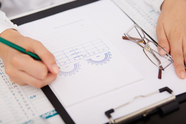 Optometrist performing visual field test