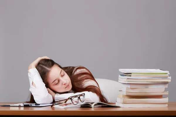 Teenage girl studying at the desk being tired, — Stock Photo, Image