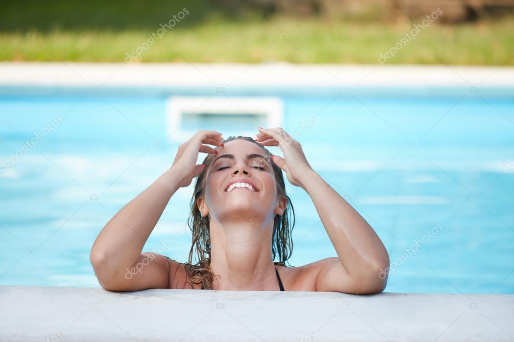 woman relaxing at swimming  pool