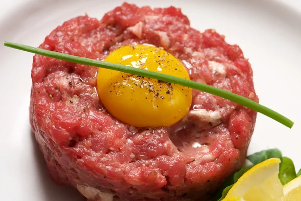 Beef tartare with capers yolk and mustard — Stock Photo, Image