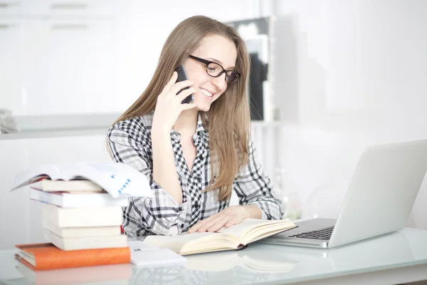 Young student talking to mobile — Stock Photo, Image