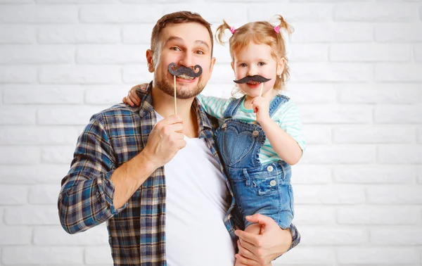 Funny family father and child with a mustache — Stock Photo, Image