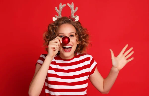 Delighted Funny Young Woman Christmas Reindeer Costume Laughs Holds Red — Stock Photo, Image