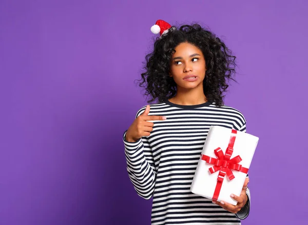 Young Sceptical Ethnic Female Curly Hair Looking Away Pointing Wrapped — Stock Photo, Image