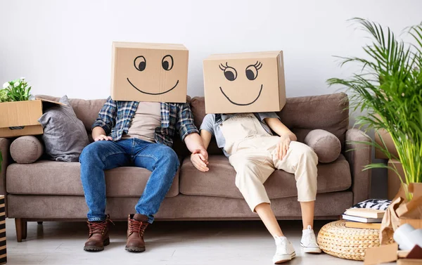 Unrecognizable Couple Wearing Carton Boxes Smiles Sitting Sofa New Apartment — Stock Photo, Image