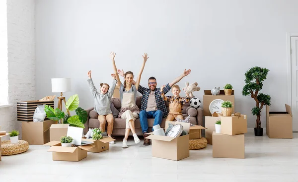 Cheerful Family Sitting Sofa New Apartment — Zdjęcie stockowe