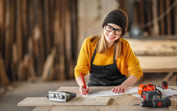 Cheerful Young Female Carpenter Looking Camera While Checking Documents Working — Stock Photo, Image