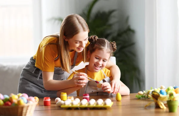 Smiling Mother Cute Girl Aprons Painting Eggs Colorful Gouache While — Stock Photo, Image