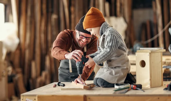 Professional Craftsman Teaching Little Son Use Drill While Making Together — Stock Photo, Image