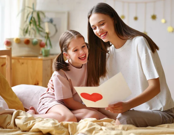 Optimistic Woman Girl Hugging Smiling While Sitting Bed Reading Greeting — Stock Photo, Image