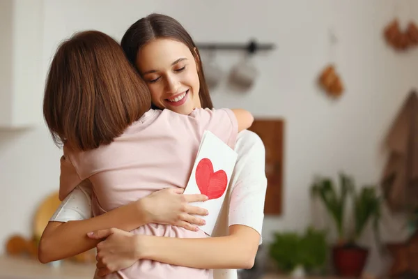 Young Woman Greeting Card Smiling Closed Eyes Hugging Girl Mother — Stock Photo, Image
