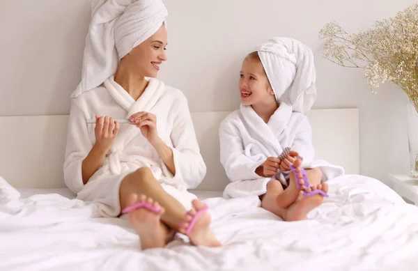 Full Body Young Mother Daughter Bathrobe Towels Smiling Filing Nails — Stock Photo, Image