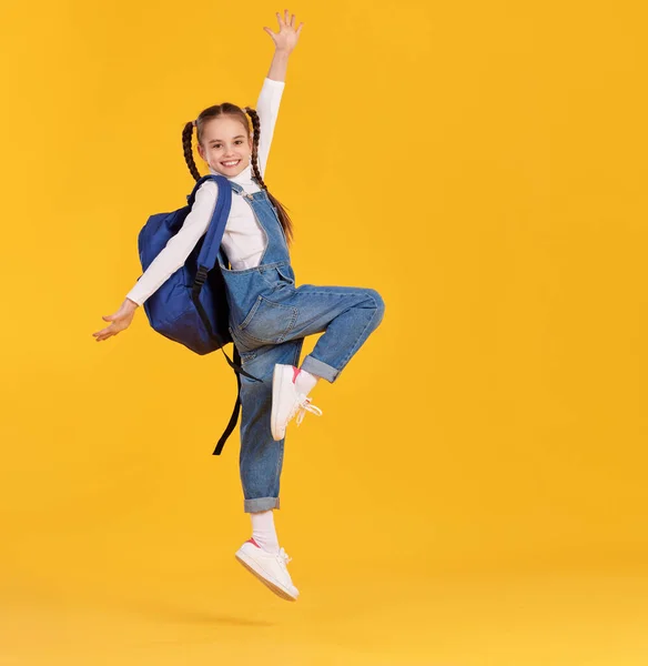 Full Body Happy Energetic Primary Schoolgirl Pigtails Wearing Denim Jumpsuit — Stock Photo, Image