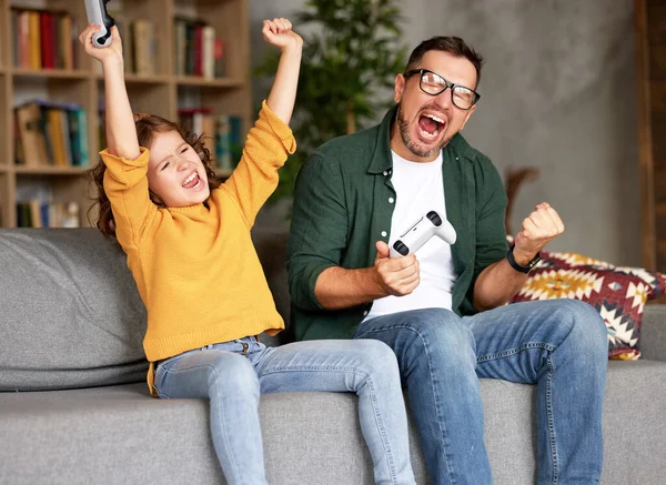 Young Happy Man Father Excited Daughter Celebrating Victory While Playing — Stock Photo, Image