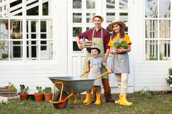 Full Body Happy Family Plants Wheelbarrow Smiling Looking Camera While — ストック写真