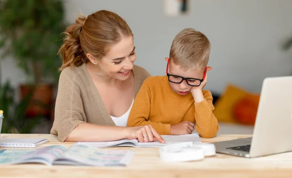 Tired Little Schoolboy Doing Exercises Copybook While Studying Remotely Home — Stock Photo, Image