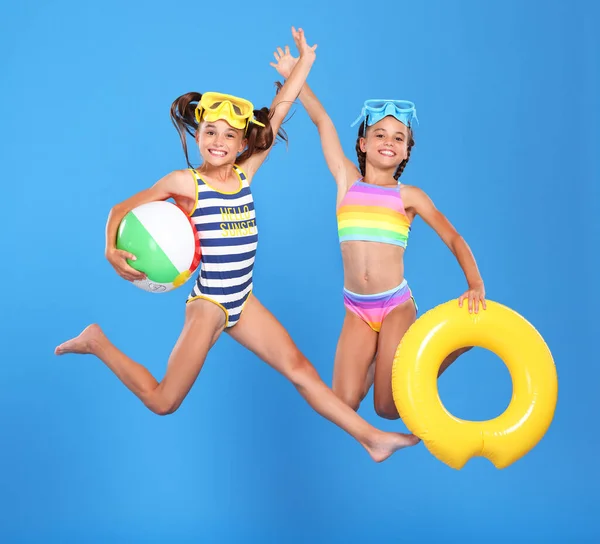 Two Funny Little Girls Sisters Swimsuits Swimming Goggles Jumping Air — Stock Photo, Image