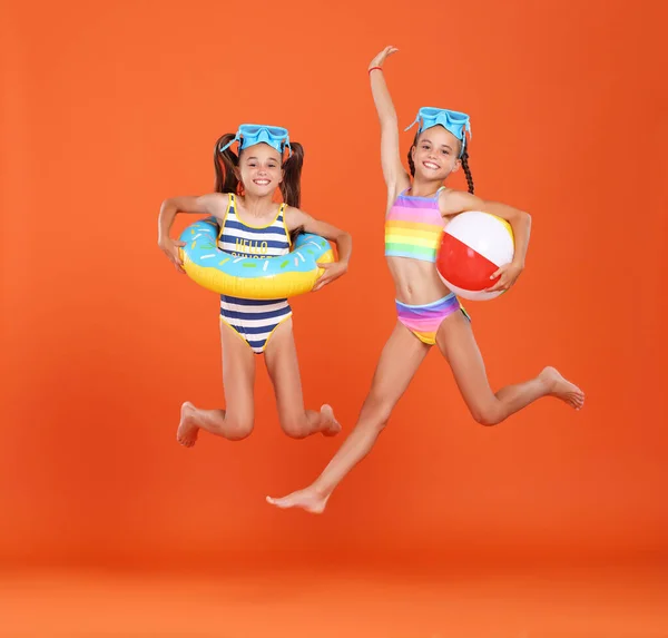 Two Funny Little Girls Sisters Swimsuits Swimming Goggles Jumping Air — Stock Photo, Image